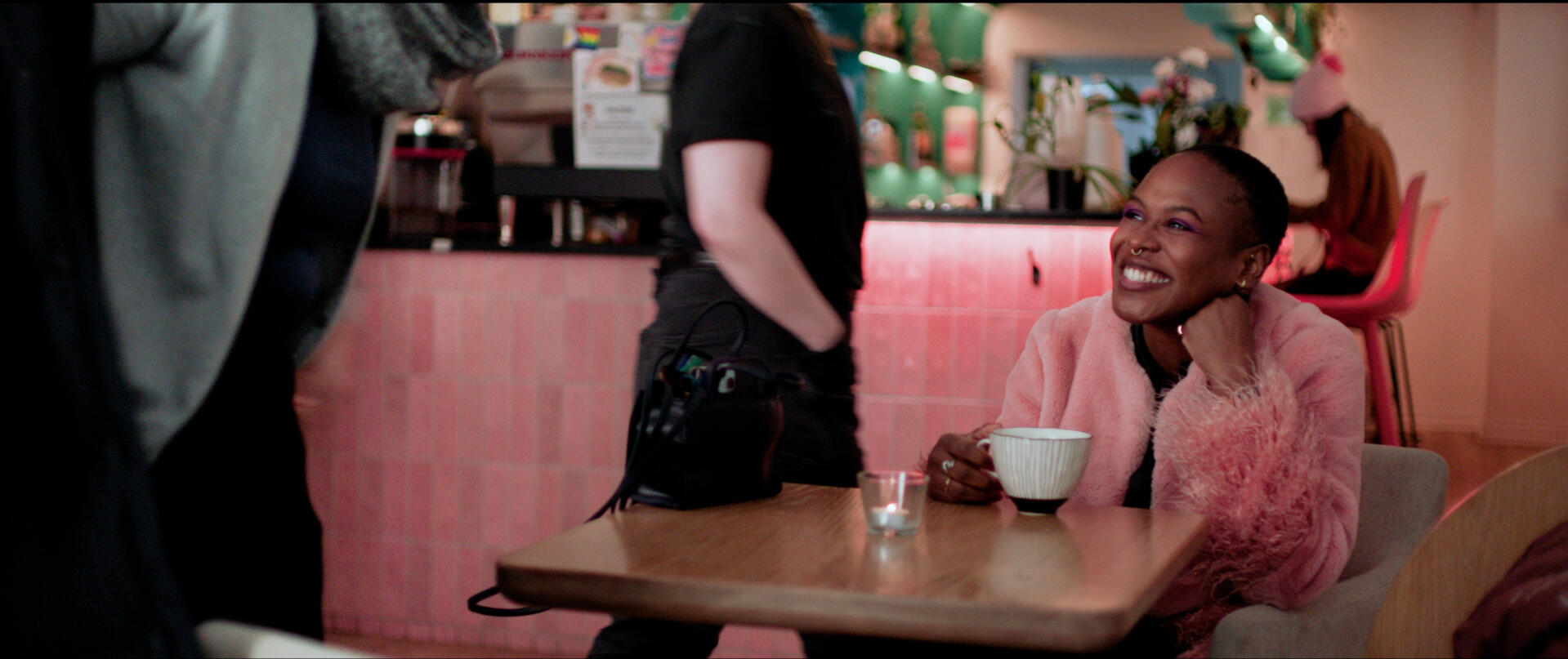 Woman drinking coffee in a cafe